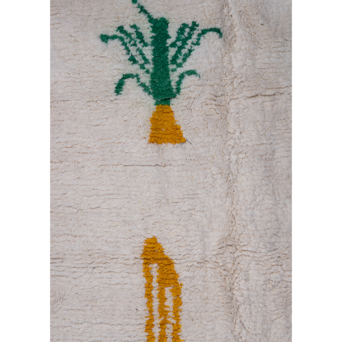 BFGF x A New Tribe Moroccan Berber cream wool rug featuring playful fruit design.