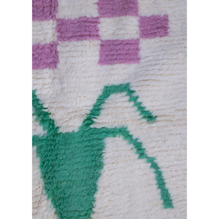 BFGF x A New Tribe Moroccan Berber cream wool rug featuring palm tree and vase design.