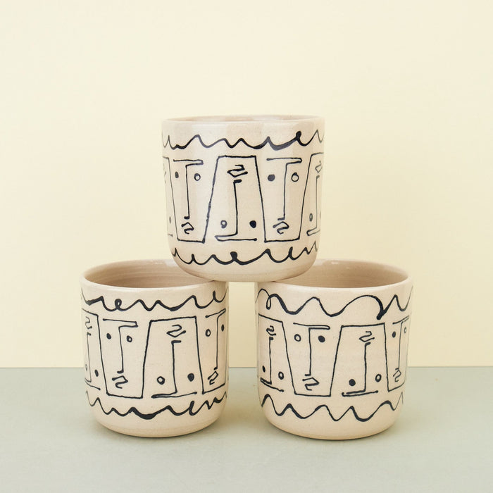 Faces Ceramic Cup