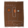 LRNCE embroidered brown blanket with abstract face design