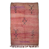 Moroccan Boujad wool hand-knotted rug with soft pink ombre base and black Berber symbols