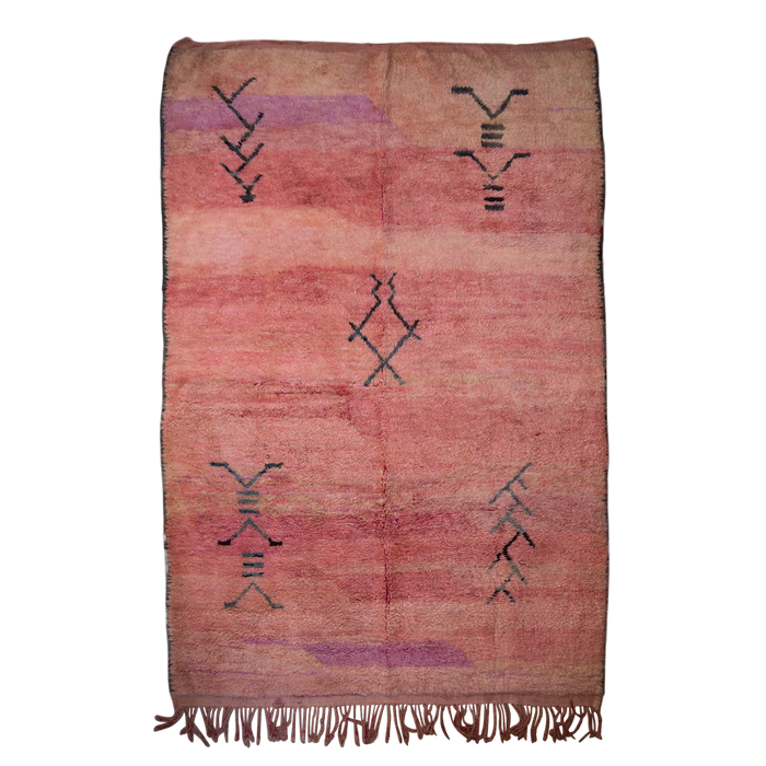 Moroccan Boujad wool hand-knotted rug with soft pink ombre base and black Berber symbols