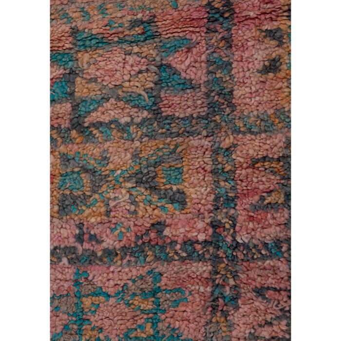 Vintage Moroccan Berber rug in pink with a soft geometric design.