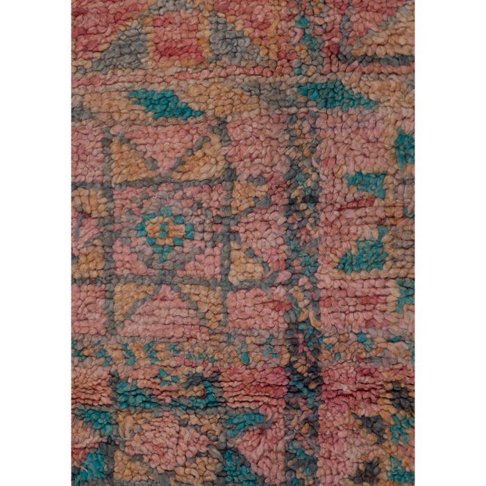 Vintage Moroccan Berber rug in pink with a soft geometric design.