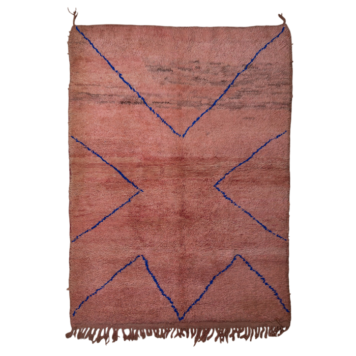 Rust-coloured peachy pink Moroccan Berber rug with a simple linear design in cobalt blue.