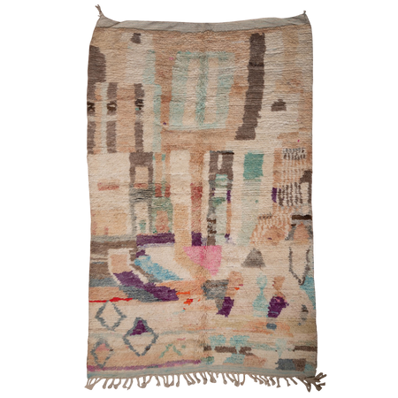 Multicolored woven rug with geometric pattern on a white background