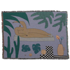 Woven art blanket featuring a reclining figure among tropical foliage and objects by BFGF