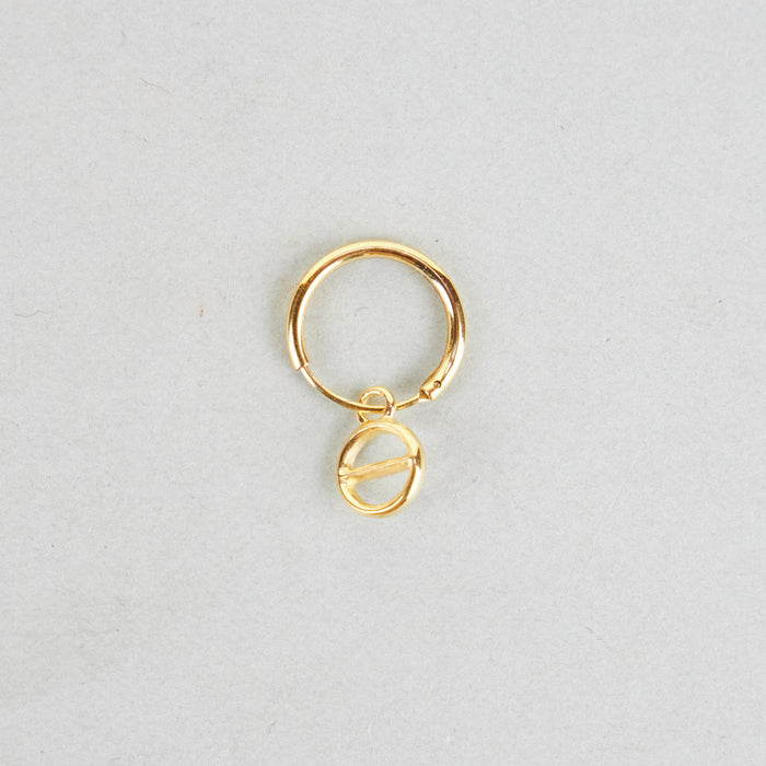 gold hoop with small pendant. 