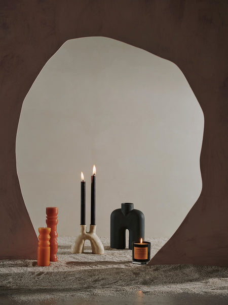 Hand-built sculptural ceramic vase or candle holder with double opening, available in white and black.