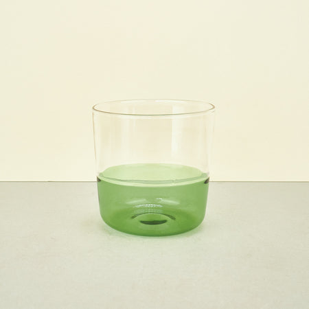 glass cocktail or water jug and drinking glasses in light freen