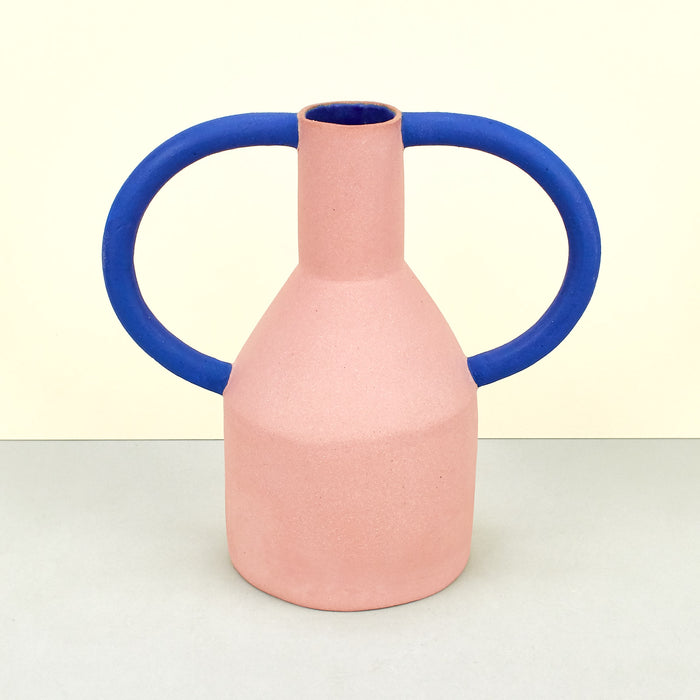 Matte pink vases with cobalt blue internal glaze with blue handles