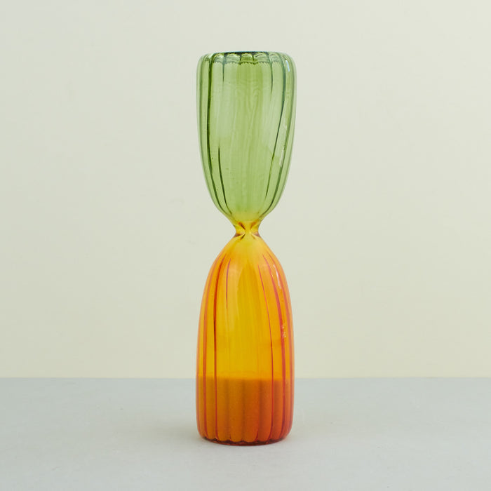colourful sand-timer with split-coloured reeded glass