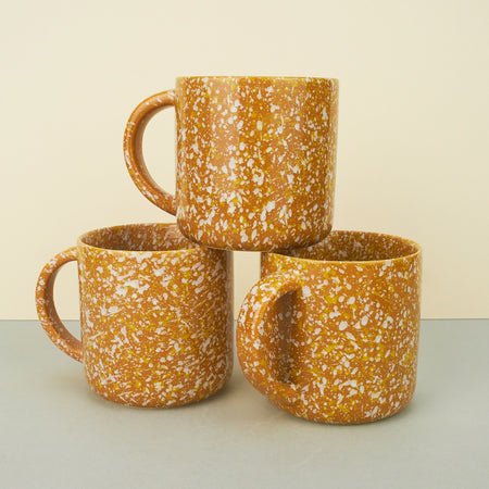 yellow stoneware mug