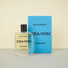 'Continental' perfume by CRA-YON, clear bottle next to blue perfume box. 