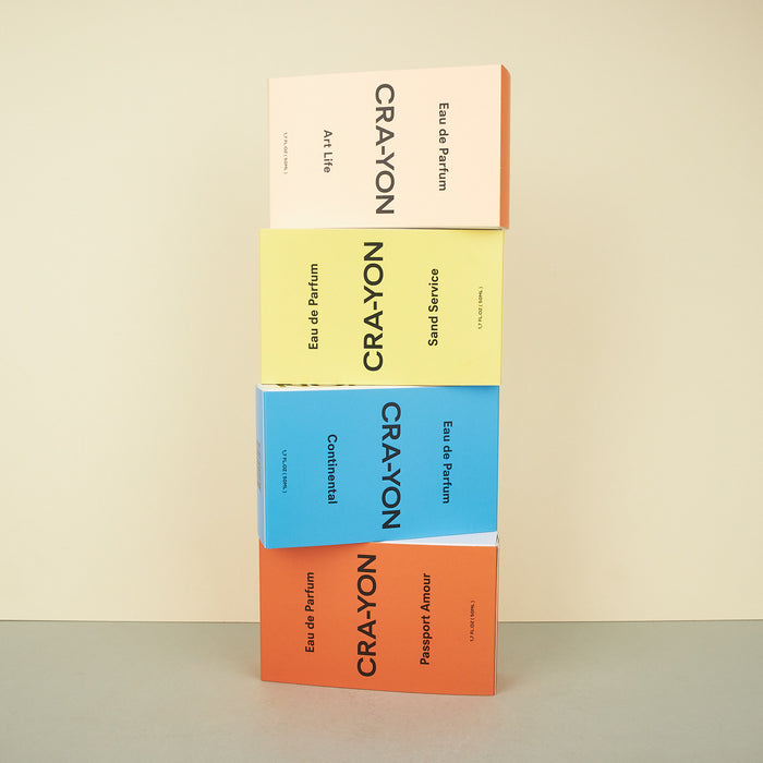 'Continental' perfume by CRA-YON, multi coloured boxes stacked on top of each other. 