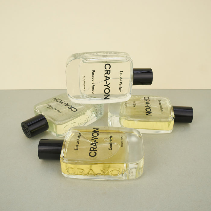 'Continental' perfume by CRA-YON, four perfume bottles on a plain background. 