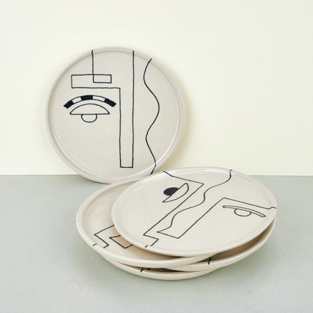 ceramic plates with abstract faces. 