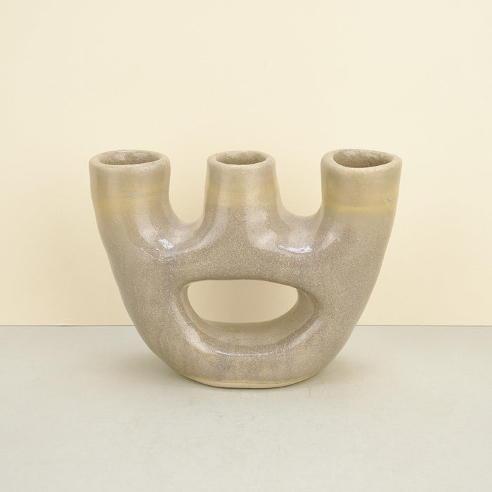 Hand-built sculptural ceramic vase with three openings beige