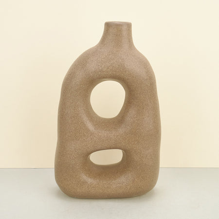 hand-built sculptural ceramic tall vase in beige