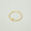 'Flora' Micro Ring by Nagle & Sisters 18ct gold plated silver. thin ring on plain background.