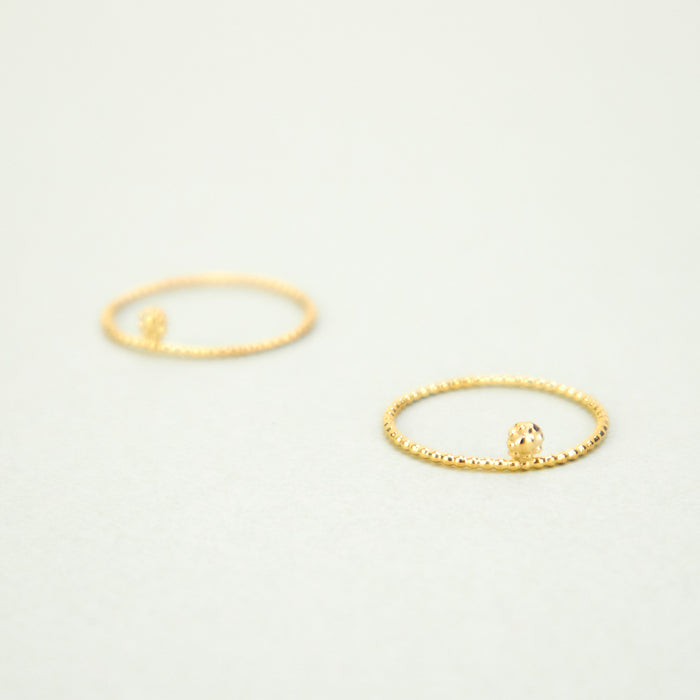 'Flora' Micro Ring by Nagle & Sisters 18ct gold plated silver. two thin rings on plain background.