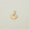 gold stud earring attachment in gold with crystals  on a plain background a new tribe 